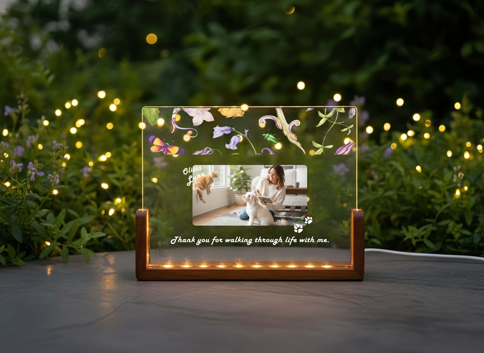 Custom acrylic pet memorial night light featuring a dog photo on a glowing wood base.