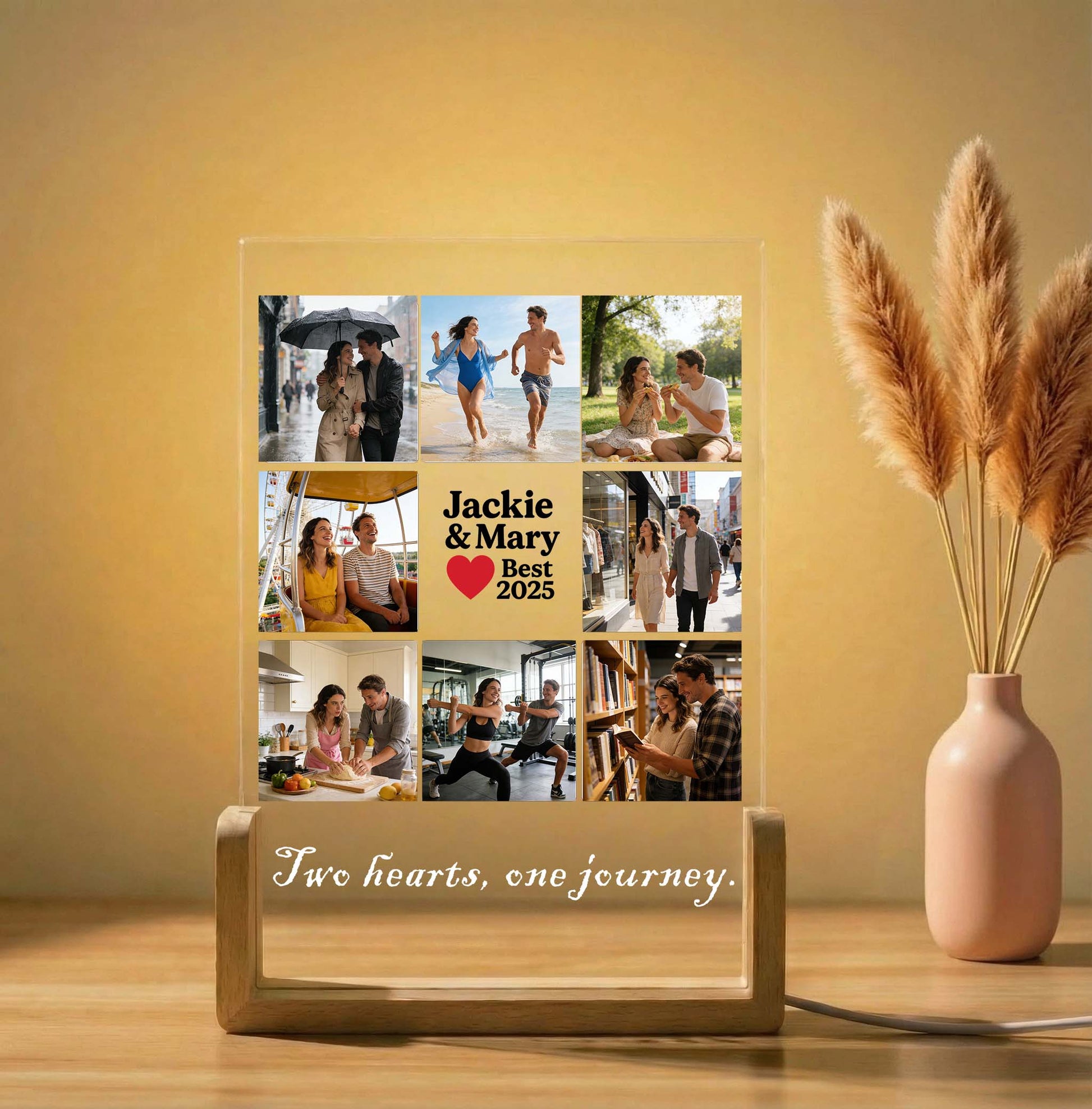 Personalized photo collage frame with 'Jackie & Mary Best 2025' text, displaying various photos of a couple, on a wooden surface with a vase of pampas grass.