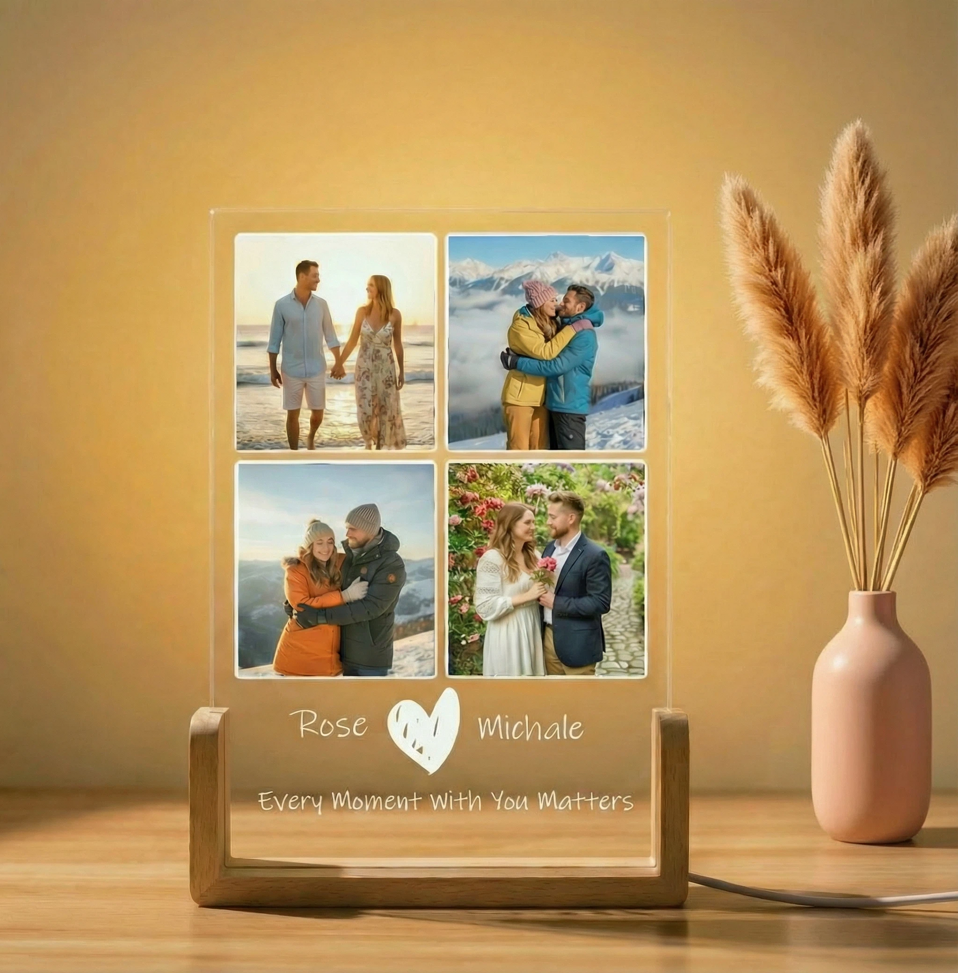 Personalized photo collage display with four images of a couple and engraved names on a wooden stand.